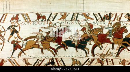 Bayeux Tapestry 1067 : bataille de Hastings, 14 octobre 1066. Cavalerie normande avec des lances et des boucliers, soutenue par des archers, en charge vers l'anglais. Norman invasion Anglo-Saxon textile Lin Banque D'Images