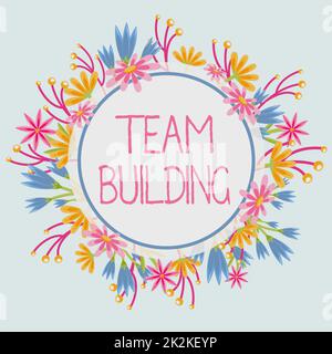 Légende présentant Team Building. Aperçu des affaires types d'activités utilisées pour améliorer les relations sociales cadre décoré de fleurs colorées et de feuillages arrangés harmonieusement. Banque D'Images