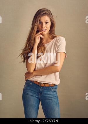 Vous n'avez pas besoin de changer une chose. Studio photo d'une belle jeune femme posant dans le studio. Banque D'Images