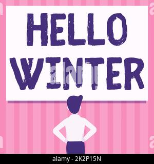 Affiche textuelle indiquant Hello Winter. Idée d'affaires saison la plus froide de l'année dans les zones polaires et tempérées homme dessin mains debout N hanches regardant un tableau blanc vide. Banque D'Images