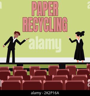 Inspiration montrant le recyclage du papier d'affichage. Concept signifiant utiliser les déchets papier d'une nouvelle manière en les recyclant des collègues hommes et femmes faisant la présentation sur scène avec des gestes de main. Banque D'Images