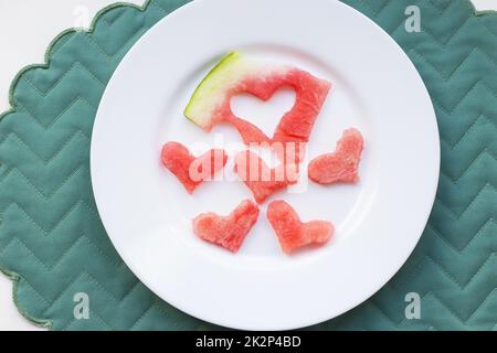 Watermelon sur une plaque blanche Banque D'Images