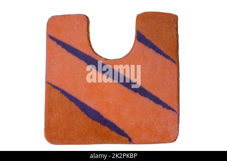 Gros plan sur un tapis ou un tapis de bain doux et doux, bleu orange et antidérapant, isolé sur un fond blanc. Accessoires de bain. Vue de dessus. Banque D'Images