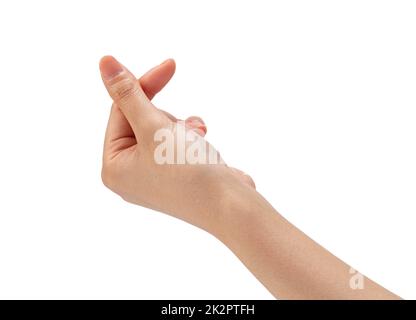 Main femelle avec coeur de doigt sur fond blanc. Banque D'Images