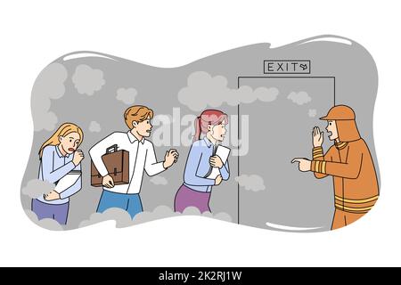 Un pompier aide les employés à s'échapper du bureau en cas d'incendie Banque D'Images