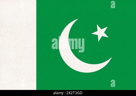 Drapeau de la République islamique du Pakistan. Drapeau pakistanais sur la surface du tissu Banque D'Images