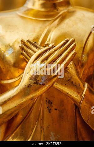 Statue de Bouddha mains close up Banque D'Images