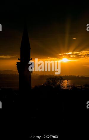 Détail minaret de la mosquée bleue au coucher du soleil Banque D'Images