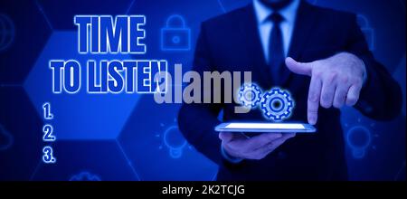 Signe de texte montrant le temps à ListenGive attention à quelqu'un ou quelque chose afin d'entendre. Mot écrit sur donner l'attention à quelqu'un ou quelque chose dans Banque D'Images