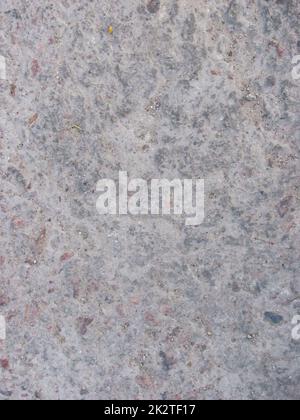 la texture brute de béton avec des mouchetures de granit rouge Banque D'Images