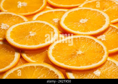 Tranches de fruits orange colorés Banque D'Images