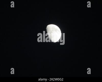 moon satellite light orbits rotate reflection distance waning crater Stock Photo