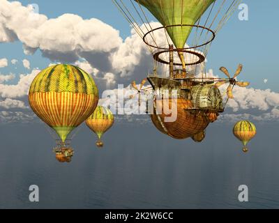 Ballons d'air chaud fantaisie au-dessus de la mer Banque D'Images