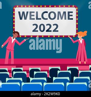 Affiche affichant Bienvenue 2022. Aperçu de l'entreprise célébration de la nouvelle année motivation pour commencer des cheers Félicitations collègues masculins et féminins faisant la présentation sur scène avec des gestes de main. Banque D'Images