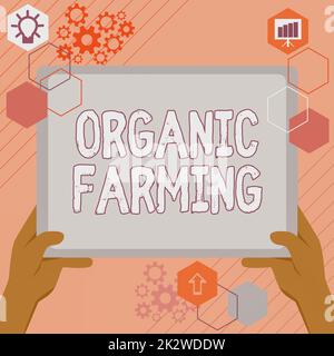 Affiche Agriculture biologique. Approche d'entreprise un système agricole intégré qui s'efforce de faire du développement durable main en utilisant les plans de recherche de grandes tablettes pour de nouvelles idées étonnantes Banque D'Images