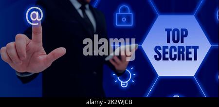 Inspiration montrant le signe Top Secret. Mot pour dire à quelqu'un des données ou informations importantes qu'il ne peut pas dire à l'homme d'affaires en costume tenant le bloc-notes symbolisant un travail d'équipe réussi. Banque D'Images