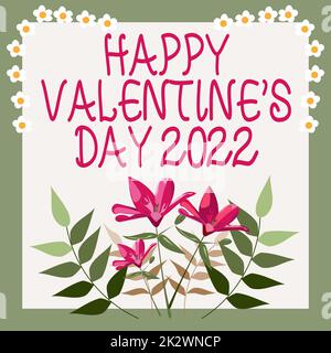 Inspiration montrant le signe HAPPY VALENTINES JOUR 2022. Mot pour blanc et rose Saint Valentin ruban décoratif jour des amoureux cadre décoré de fleurs colorées et de feuillages arrangés harmonieusement. Banque D'Images