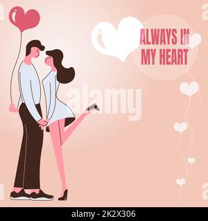 Légende de texte toujours dans MON CŒUR. Mot écrit sur l'histoire d'amour exprimant l'amant d'être quelqu'un couple spécial tenant les mains représentent couple romantique exprimant l'amour. Banque D'Images