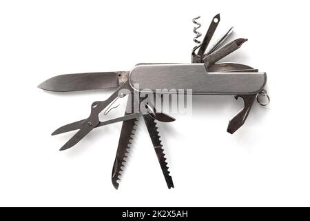 Couteau suisse métallique isolé sur blanc Banque D'Images