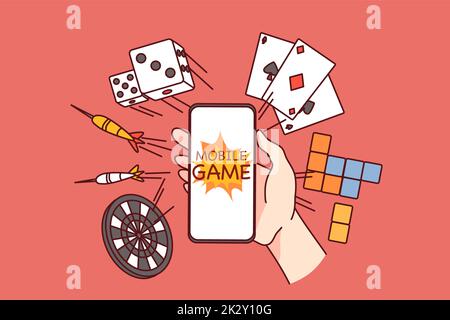 Main tenant des jeux de cellules en ligne Banque D'Images