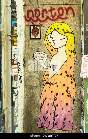 Murale représentant une femme cubiste avec coeur et ballon 'Tuk-tuk', battement de coeur. C Embajadores, Madrid, Espagne Banque D'Images