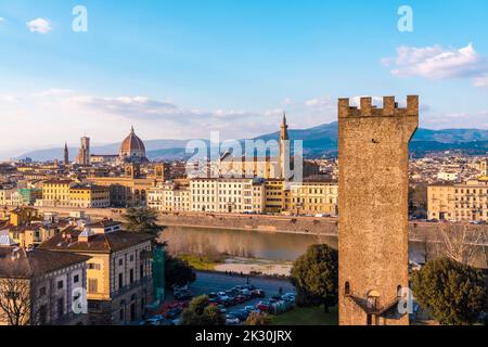 Italy, Tuscany, Florence, Arno River and surrounding buildings with Tower of San Niccolo in foreground Stock Photo