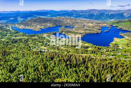 Norway, Vestfold og Telemark, Tuddal, Drone view of village in Scandinavian Mountains Stock Photo