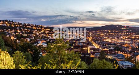 Germany, Baden-Wurttemberg, Panoramic view of Haigst, Lehen and Heslach districts at dusk Stock Photo