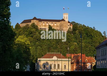 Slovenia, Ljubljana, Ljubljana Castle overlooking Slovenian Philharmonic Building below Stock Photo