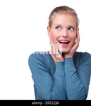 Je n'y crois pas. Une photo en studio d'une belle jeune femme qui a l'air surprise. Banque D'Images