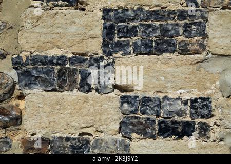 Flint et mur en pierre de l'église Saint Martin dans la rue de la porte de Nevers, Saint Valery sur somme, somme, Picardie, hauts de France, France Banque D'Images