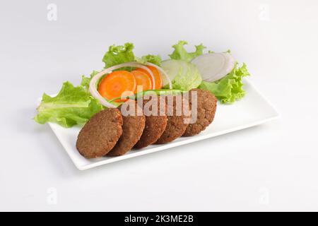 Shami kabab photographie traditionnelle de la nourriture. Jali kabab style bangladais. mouton ou poulet shami ou tikia ou kabab, spécial non végétarien. Banque D'Images