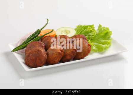 Shami kabab photographie traditionnelle de la nourriture. Jali kabab style bangladais. mouton ou poulet shami ou tikia ou kabab, spécial non végétarien. Banque D'Images