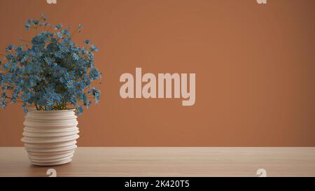 Plateau de table en bois ou étagère avec vase en poterie avec marguerites bleues, fleurs sauvages, ornement, prairie, herbe, encore la vie, branche dans vase, orange fond wi Banque D'Images