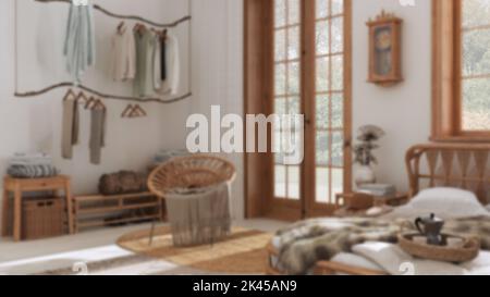 Arrière-plan flou, boho chic ferme chambre avec lit en rotin, armoire rustique et fauteuil. Moquette de jute. Papier peint vintage, intérieur bohème Banque D'Images