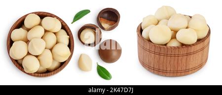 noix de macadamia dans un bol en bois isolé sur fond blanc avec pleine profondeur de champ. Vue de dessus. Pose à plat Banque D'Images