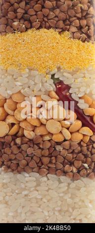 Arrière-plan vertical avec différents grains. Il occupe toute la surface de l'image. Gros plan. Banque D'Images