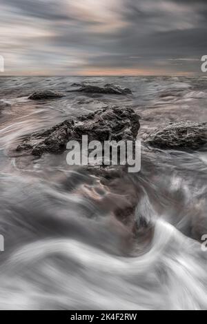 Coucher de soleil sur la plage, Rome, Italie Banque D'Images