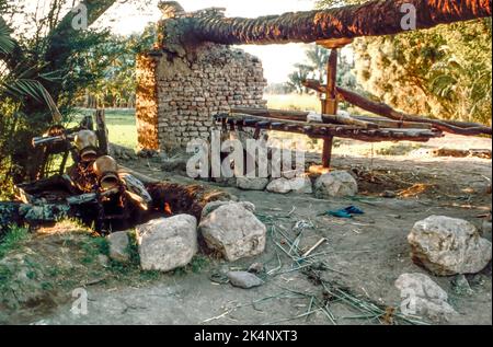 Dendera - roue de l'eau. Croisière sur le Nil supérieur - balayage d'archives à partir d'une diapositive. Février 1987. Banque D'Images