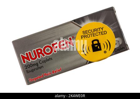 Sécurité étiquette protégée sur l'emballage de Nurofen 200mg Caplets Ibuprofen soulagement de la douleur ciblé isolé sur fond blanc Banque D'Images