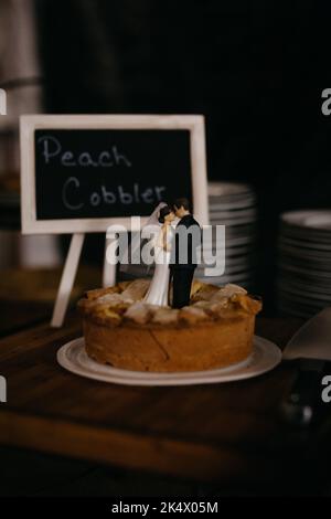 Cobbler à la pêche avec des personnages de mariée et de marié sur le dessus Banque D'Images