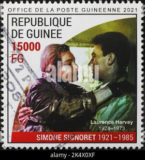 Simone Signoret et Laurence Harvey sur timbre-poste Banque D'Images