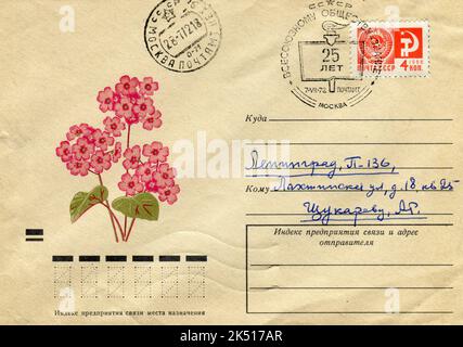 URSS - vers 1972: Une enveloppe postale de la première journée de l'URSS avec des timbres. 25 ans de la société de la connaissance de l'Union. Banque D'Images