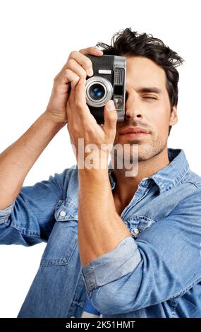 Prendre une photo. Un beau jeune homme prenant une photo de vous. Banque D'Images