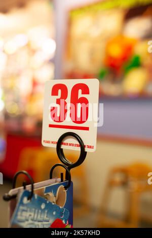 MONROE, LOUISIANE - 24 mai 2014: Numéro de table à Chuck E. Cheese Banque D'Images