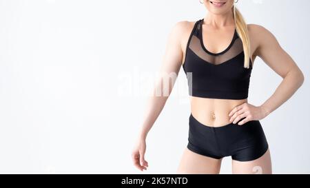modèle femme en tissu sportif fin Banque D'Images