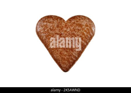 Coeur en pain d'épice sur fond blanc. Banque D'Images