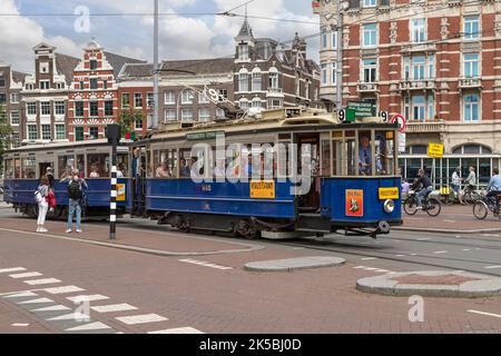 Visite historique avec l'ancien tramway de la résistance de 1929, à travers le centre d'Amsterdam. Banque D'Images