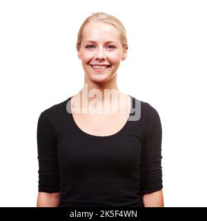 Elle a un grand sourire. Portrait d'une belle jeune femme souriant sur fond blanc. Banque D'Images