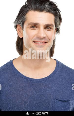 HES toujours positif. Portrait studio d'un beau homme posant sur un fond blanc. Banque D'Images